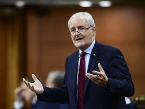 Marc Garneau answers a question during question period in the House of Commons on Parliament Hill in Ottawa on Tuesday, Oct. 6, 2020.