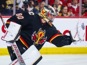 Calgary Flames goaltender Dan Vladar makes a save against the Boston Bruins during the first period at Scotiabank Saddledome.