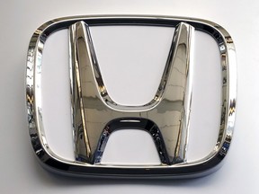 This Feb. 14, 2019 file photo shows a Honda logo at the 2019 Pittsburgh International Auto Show in Pittsburgh.