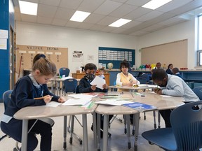 Grade one students at Calgary Classical Academy spend the morning in Mrs. D'Douza's class on March 17, 2023.