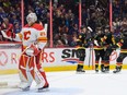 VANCOUVER, CANADA - APRIL 8: Cole McWard #48 of the Vancouver Canucks is congratulated after scoring his first NHL goal on Jacob Markstrom #25 of the Calgary Flames during the first period of their NHL game at Rogers Arena on April 8, 2023 in Vancouver, British Columbia, Canada.