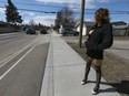 A sex trade worker is shown on the 19th Avenue S.E. stroll in Calgary on Tuesday, April 11, 2023. She has been in the trade for over 20 years and can make up to $1,500 a day or nothing as she works seven days a week. The area was mentioned by Calgary police when they arrested a man recently and charged him with numerous crimes.