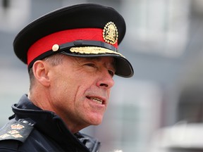 Calgary police Chief Mark Neufeld leaves after speaking to media in Calgary on Thursday, April 13, 2023 at the most recent shooting scene in Kensington.