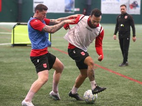 Cavalry FC Cavalry FC Fraser Aird (L) and Sergio Camargo during practice at Macron Performance Centre in Calgary on Tuesday, April 25, 2023. Jim Wells/Postmedia