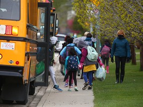 FILE PHOTO: St. Pius X Elementary School students head back to school on Tuesday, May 25, 2021.