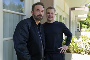 Ben Affleck, left, and Matt Damon pose for a portrait to promote the film "Air" at the Four Seasons Hotel in Los Angeles.
