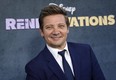 Jeremy Renner, the host and executive producer of "Rennervations," poses at the premiere of the four-part Disney+ docuseries, Tuesday, April 11, 2023, at the Westwood Regency Village Theatre in Los Angeles.