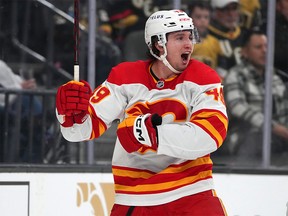 Calgary Flames left wing Jakob Pelletier celebrates after scoring a goal against the Vegas Golden Knights during the first period at T-Mobile Arena in Las Vegas on February 23, 2023.