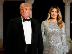 Former U.S. President Donald Trump, who announced a third run for the presidency in 2024, and his wife Melania Trump, attend the New Year's Eve party at his Mar-a-Lago resort in Palm Beach, Florida December 31, 2022.