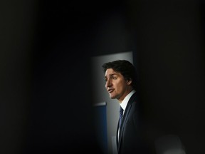 Prime Minister Justin Trudeau takes part in an announcement and press conference at Ericsson in Ottawa, Monday, April 17, 2023. Trudeau is urging caution in the face of growing calls for Canada to adopt a registry to track foreign influence efforts.