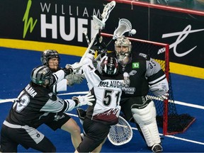 Calgary Roughnecks goaltender Christian Del Bianco makes a save against Colorado Mammoth forward Eli McLaughlin during Game 3 of the West Conference final on WestJet Field at Scotiabank Saddledome on Saturday, May 20, 2023.