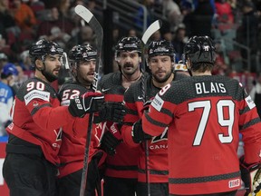 Canada's Mackenzie Weegar celebrates