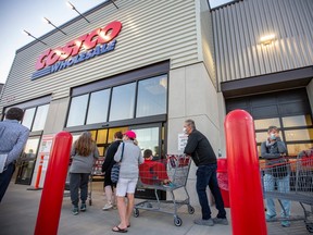 Members enter Calgary's Costco warehouse in Taza on the Tsuut'ina Nation after its opening ceremony on Friday, Aug. 28, 2020.