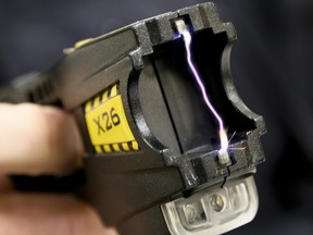 A close up of 50,000 volts arcing between the two terminals of a Taser X26 conductive energy weapon during a conducted energy weapon training session on May 14, 2015.