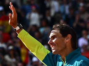 Spain's Rafael Nadal waves a after victory over Norway's Casper Ruud..