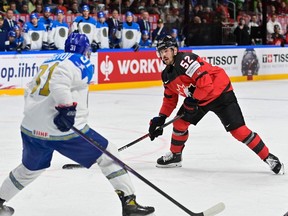 Canada's MacKenzie Weegar shoots during the IIHF Ice Hockey Men's World Championship.