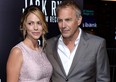 Actor Kevin Costner and Christine Baumgartner attend the premiere of Paramount Pictures' "Jack Ryan: Shadow Recruit" at TCL Chinese Theatre on January 15, 2014 in Hollywood, California.