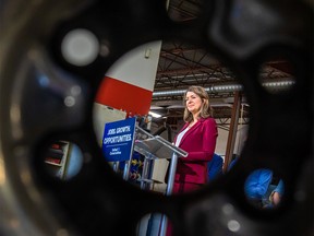 UCP leader Danielle Smith makes a campaign announcement at Braeside Automotive in Calgary on Thursday, May 4, 2023.