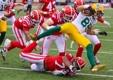 Calgary Stampeders players tackle Edmonton Elks wide receiver Gavin Cobb during preseason CFL action at McMahon Stadium in Calgary on Monday, May 22, 2023. Calgary won the game 29-24.
Gavin Young/Postmedia