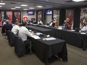 FILE PHOTO: The Calgary Flames management and scouts during the 2020 NHL Draft.