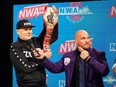 The Smashing Pumpkins frontman Billy Corgan, left, owns the National Wrestling Alliance, once the industry's premier organization. Pictured with him is the NWA's television announcer Kyle Davis.