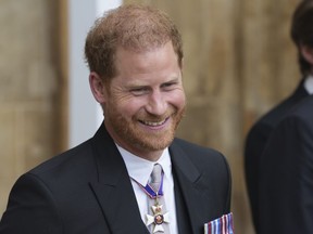 Prince Harry leaves Westminster Abbey after the Coronation of King Charles III in London, Saturday, May 6 2023.