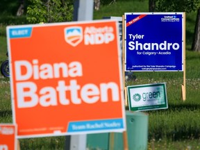 Election signs in the Calgary-Acadia riding.