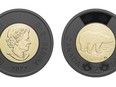 The black-ringed toonie the Royal Canadian Mint released to memorialize the late Queen Elizabeth is shown in a handout photo.