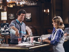 Ted Danson and Shelley Long are seen on the famous Cheers bar set.