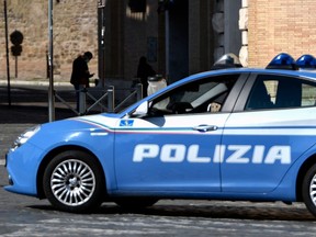 An Italian national police vehicle is pictured in Rome in this file photo taken on March 19, 2020 during the lockdown due to the coronavirus pandemic.