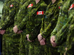Canadian Forces personnel stand at CFB Kingston in Kingston, Ont., March 7, 2023.