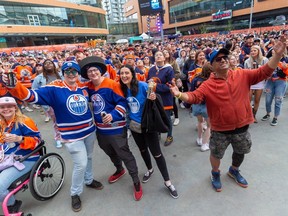 People take part in the Edmonton Oilers watch party in the Ice District on Saturday, May 6, 2023 in Edmonton. Greg Southam-Postmedia