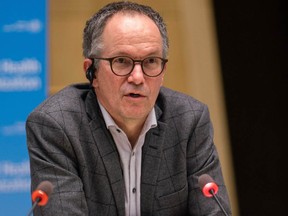 This handout picture taken and released on February 12, 2021 by World Health Organization (WHO) shows Wuhan mission leader Peter Ben Embarek delivering remarks during a press conference in Geneva.