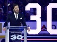 Former New York Ranger Henrik Lundqvist speaks during his jersey retirement ceremony.