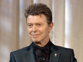 In this June 5, 2007 file photo, singer David Bowie accepts the lifetime achievement award at the 11th Annual Webby Awards in New York.