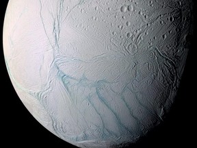 In this NASA handout image obtained Wednesday, June 14, 2023, a combination of high-resolution images taken during a 2005 flyby of NASA's Cassini spacecraft were combined into this mosaic to show Saturn's moon Enceladus, with long fissures at the moon's south pole that allow water from the subsurface ocean to escape into space.