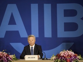 Jin Liqun, the first president of the Asian Infrastructure Investment Bank (AIIB), speaks to journalists during a press conference in Beijing on January 17, 2016.