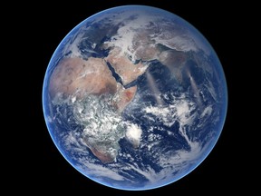 This file photo from the NASA Earth Observatory released Aug. 21, 2014 and acquired March 30, 2014 shows an image of the Earth.