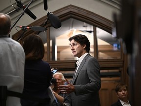 Prime Minister Justin Trudeau speaks to reporters as he arrives for a cabinet meeting on Parliament Hill in Ottawa, on Tuesday, June 6, 2023.