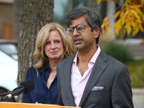 NDP candidate Samir Kayande joins NDP Leader Rachel Notley at a news conference in southwest Calgary.