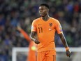 FILE - Netherlands' Quincy Promes looks on during the Euro 2020 group C qualifying soccer match between Northern Ireland and the Netherlands at Windsor Park, Belfast, Northern Ireland, Saturday, Nov. 16, 2019. Promes was found guilty Monday, June 19, 2023, of stabbing his nephew in the leg and was sentenced to 18 months in prison.