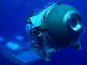 This undated image courtesy of OceanGate Expeditions, shows their Titan submersible launching from a platform.
