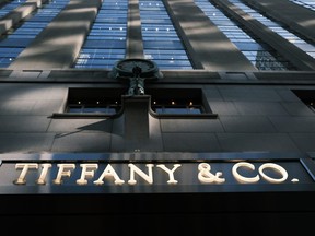 The Tiffany and Co sign is displayed outside of their flagship store along Fifth Avenue in Manhattan on Nov. 25, 2019 in New York City.