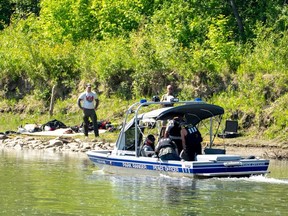 Edmonton police, park rangers and fire crews continue searching on June 7, 2023, for a missing boy, 14, last seen in the North Saskatchewan River near Terwillegar Park on Sunday, June 4, 2023.