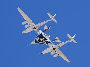 Virgin Galactic's VSS Unity departs Mojave Air & Space Port in Mojave, Calif., for the final time as Virgin Galactic shifts its SpaceFlight operations to New Mexico, Feb. 13, 2020.