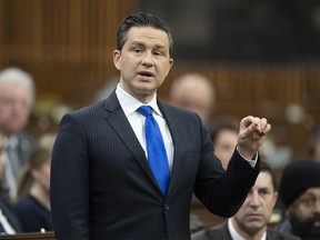 Conservative Leader Pierre Poilievre rises during Question Period on Friday, June 16, 2023 in Ottawa.