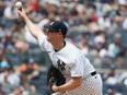 Gerrit Cole of the New York Yankees pitches against the Chicago Cubs.