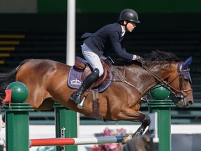 Conor Swail from Ireland riding Count Me In wins the CANA Cup at Spruce Meadows' Masters Tournament at the International Ring