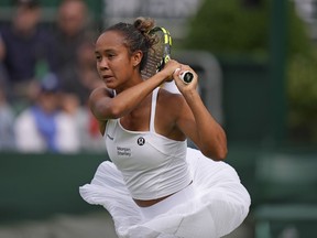 Canada's Leylah Fernandez returns to Ukraine's Kateryna Baindl in a first round women's singles match on day one of the Wimbledon tennis championships in London, Monday, July 3, 2023. Fernandez of Laval, Que., defeated Baindl in three sets, 6-4, 4-6, 6-4, to advance to the second round at Wimbledon on Monday.