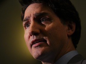 Prime Minister Justin Trudeau speaks to reporters on Parliament Hill in Ottawa on Tuesday, May 9, 2023.